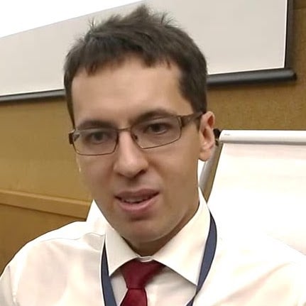 Юрий Плужник, КПМГ