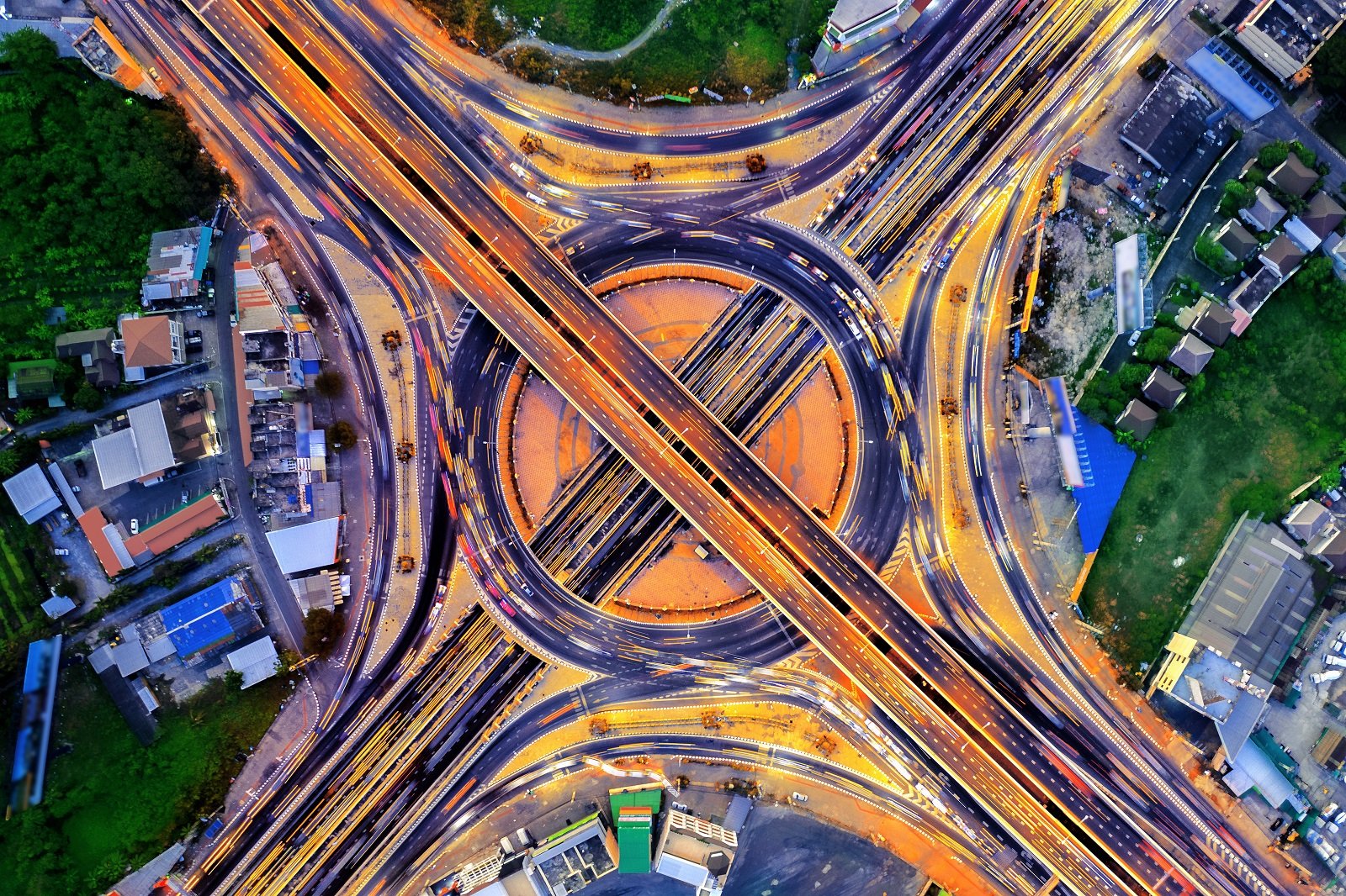 aerial-view-of-traffic-in-roundabout-and-highway-at-night